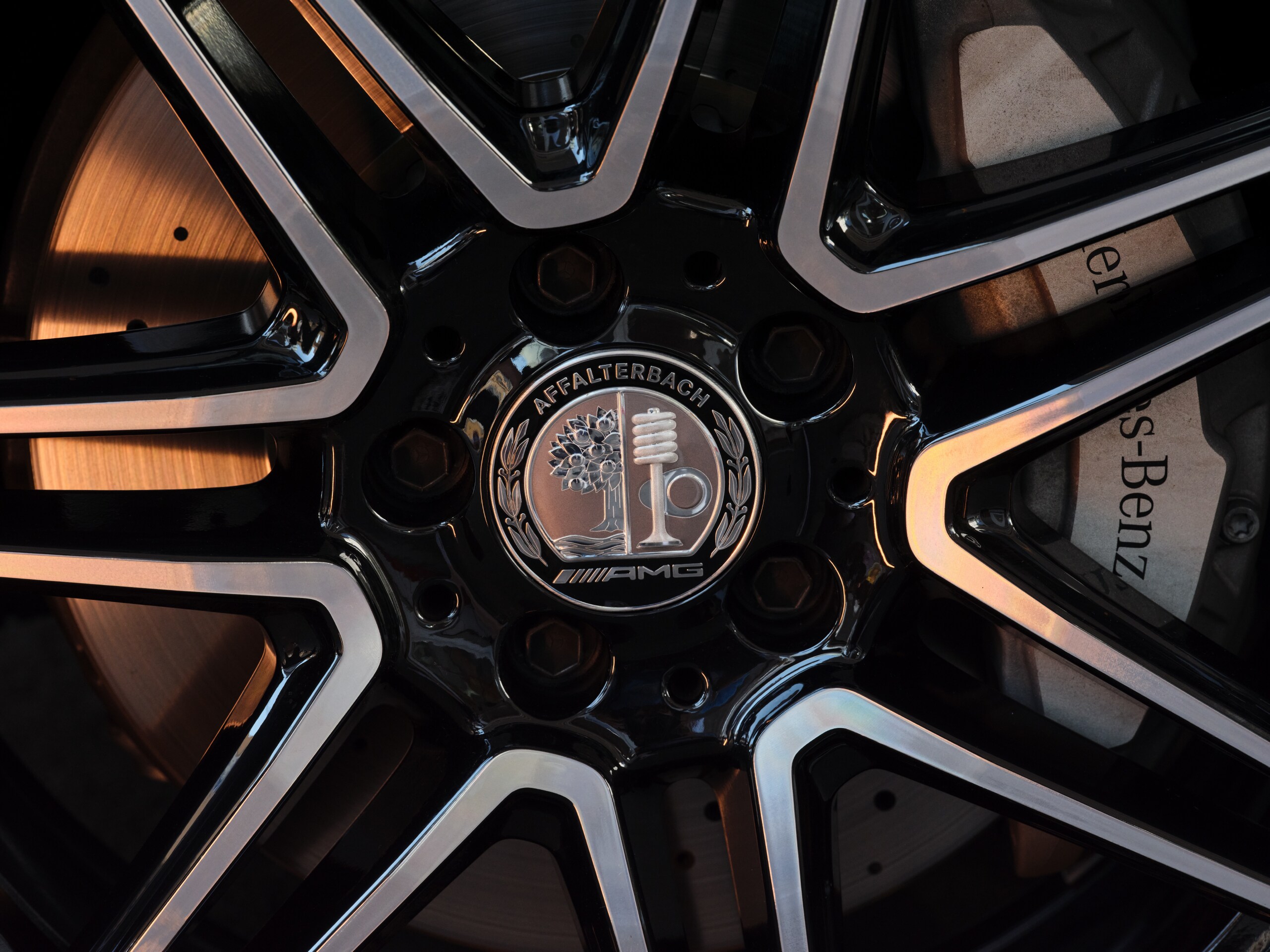 AMG Radnabenabdeckung, mit AMG Wappen silberfarben / schwarz